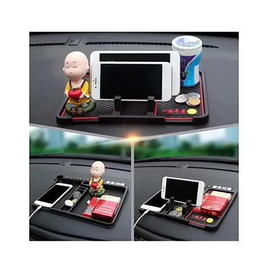 Car dashboard organizer with phone holder, cup holder, and small figurine on a white background