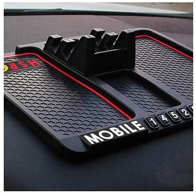 Car mat with phone holder and slots on a car dashboard