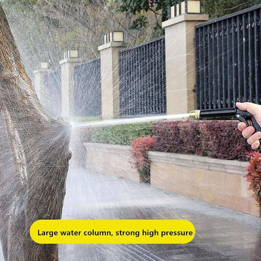Person using a high-pressure washer to clean a driveway with text 'Large water column, strong high pressure'.