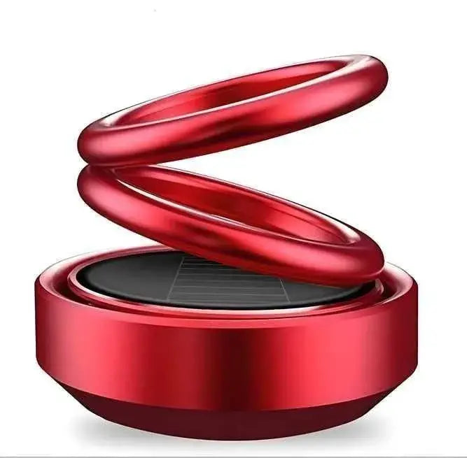 Red spiral-shaped car perfume aromatherapy diffuser on a white background