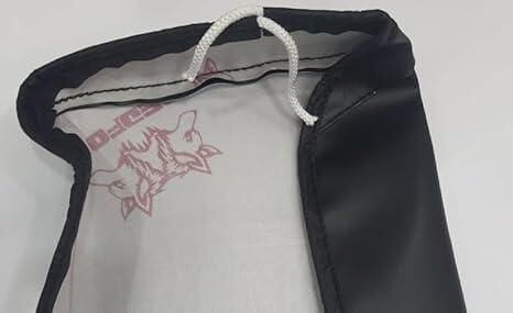 Close-up of a premium waterproof bike seat cover showcasing its elastic edges and sleek black faux leather design.