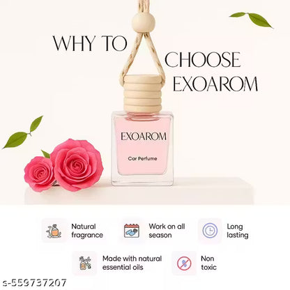 Exoarom car perfume bottle with pink liquid, surrounded by roses and leaves on a white background.